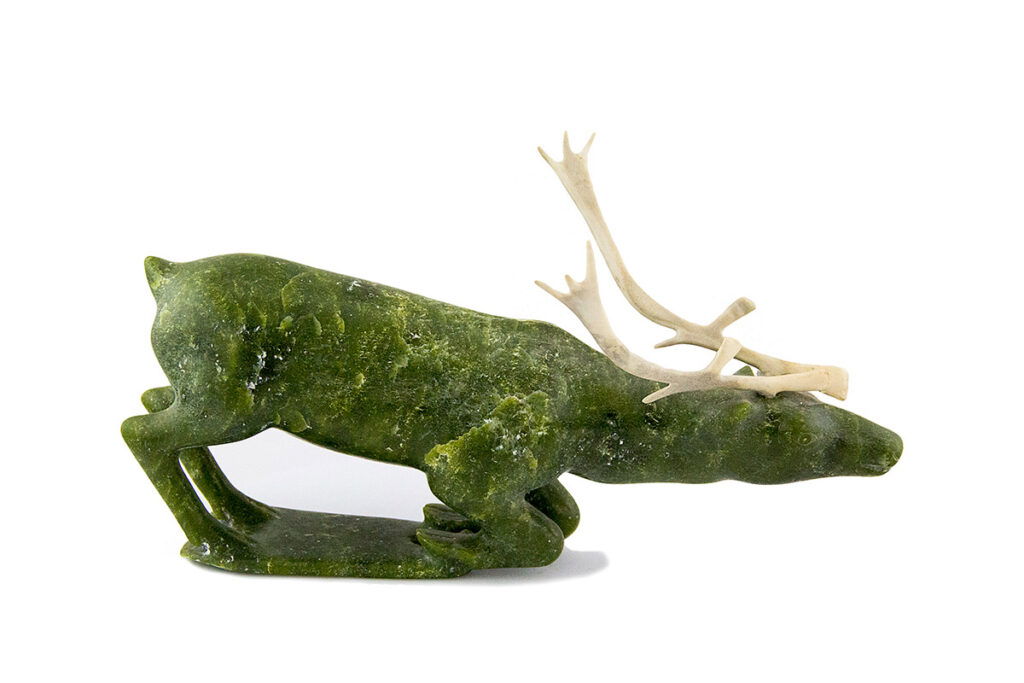 Image of Inuit artist Jacobie Adamie's kneeling caribou